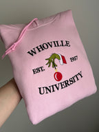 Der Whoville University Grinch Pullover in der Farbe Rosa. Der Hoodie ist Unisex und von Innen sehr flauschig. Den Hoodie gibt es als Sweater oder als Pullover mit Kapuze.