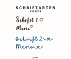Die zwei Schriftarten mit Beispieltext für die Musselin Spucktücher. Es ist ebenfalls ein Herz dabei.